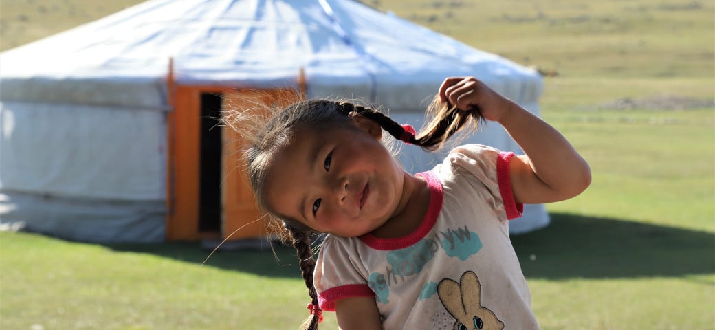 Young girl with pigtails, Host Family, Mongolia