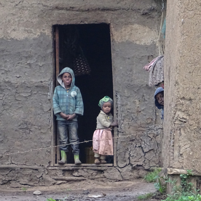 Children outside their home, Bale Mountains, Ethiopia