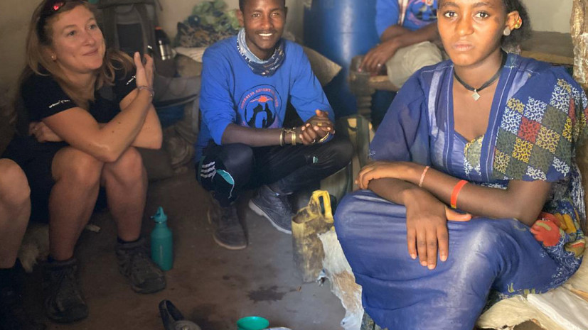 Sharing coffee with locals inside Ethiopian Hut, Gheralta, Ethiopia